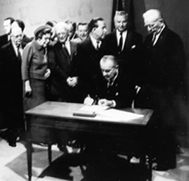 Photo of President Lyndon Baines Johnson signing the DOT Act on October 15, 1966